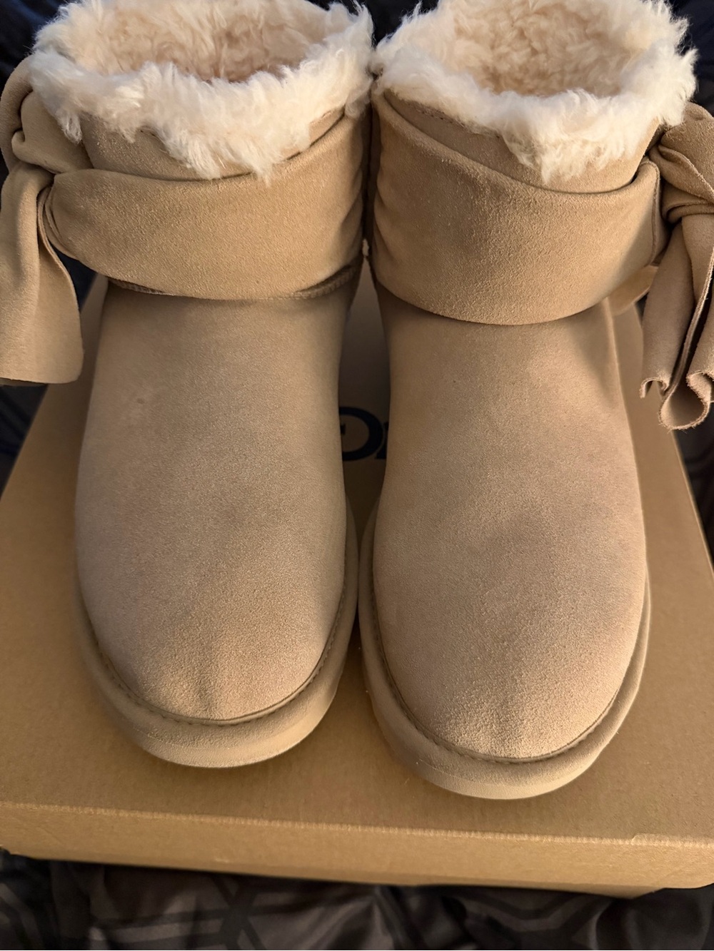 UGG Women's Shearling-Lined Ankle Boots in Chestnut Tan with Bow